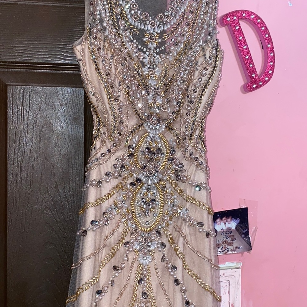 Dress size 4 fully beaded with great material